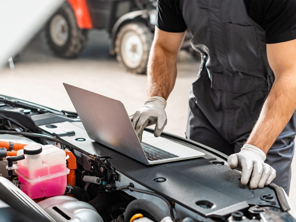 Truck Diagnostics An Engineer running diagnostics on a Truck
